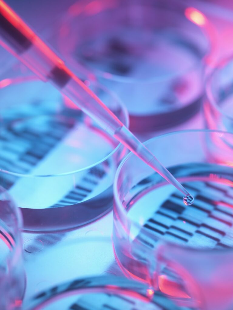 Pipetting sample into tray for DNA testing
